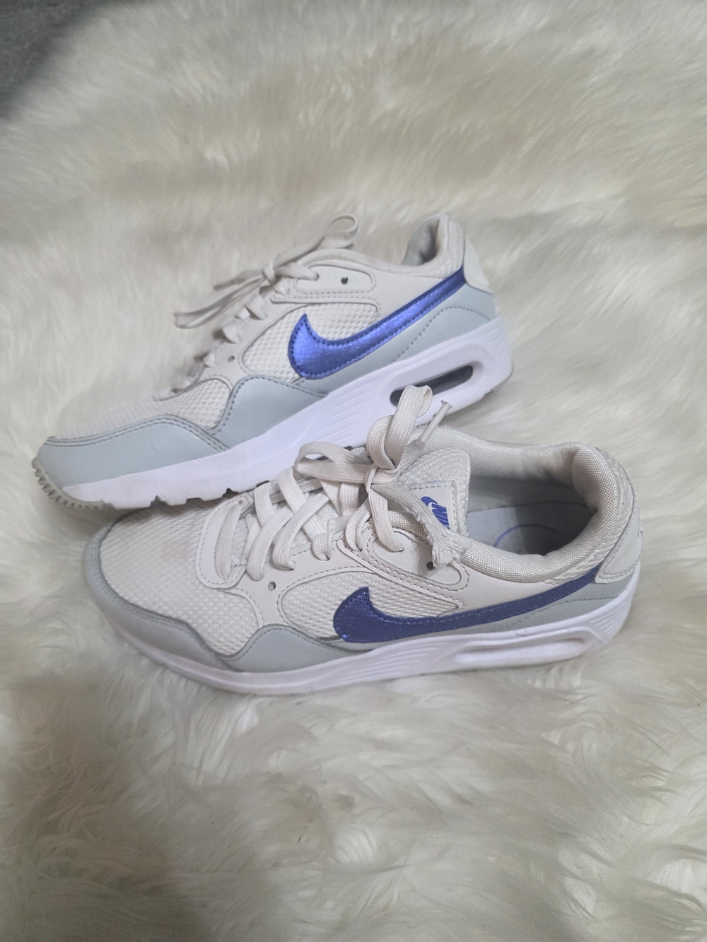 Nike Women’s Cream Sneakers with Metallic Blue Swoosh